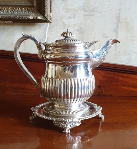 Regency sterling silver coffee pot on original stand c 1815